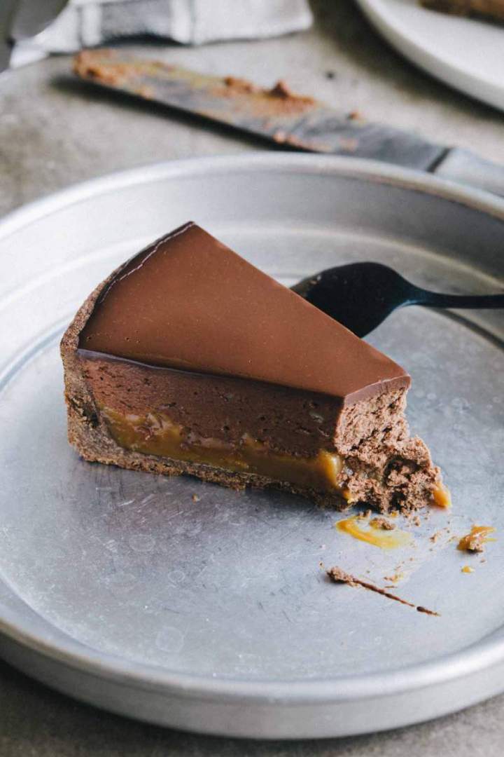 Slice of Buckwheat pie with chestnuts, caramel and chocolate