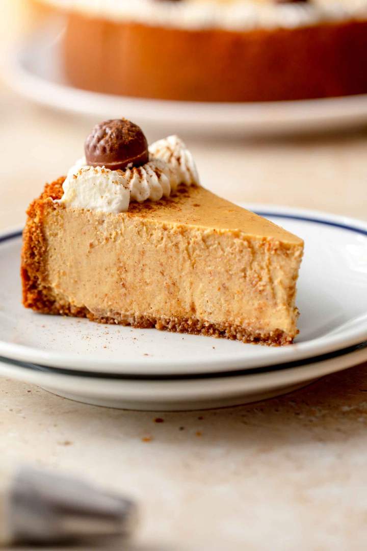 Pumpkin cheesecake is a wonderful autumn dessert made with a cookie crust and a creamy pumpkin filling. Perfect for celebrations, or to enjoy with tea. Pumpkin Cheesecake