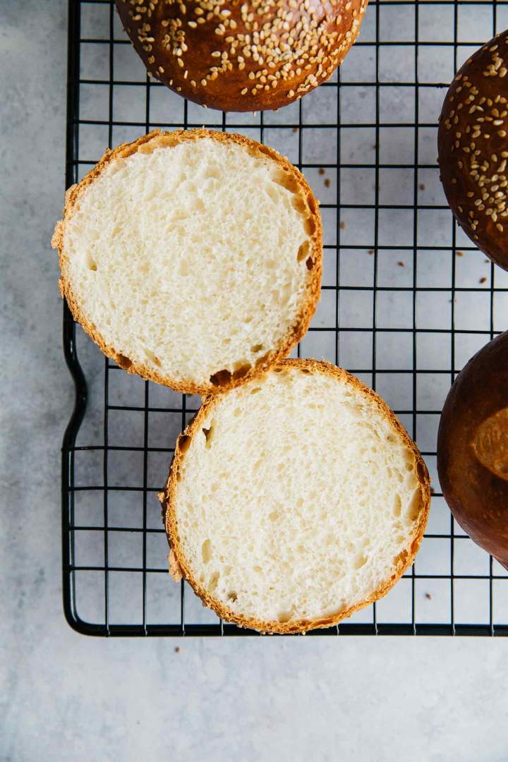 Homemade Burger Brioche Buns are so easy to make. This step by step Burger Bun Recipe and recipe video will help you make the best homemade hamburgers. The buns are soft and sprinkled with sesame. Perfect for housewarming party, picnics, fourth of July barbecue or any other weekend dinner party. #burgerbun #briochebuns #homemadehamburger #hamburgerbun #easybrioche #breadrolls #jernejkitchen Homemade Burger Brioche Buns