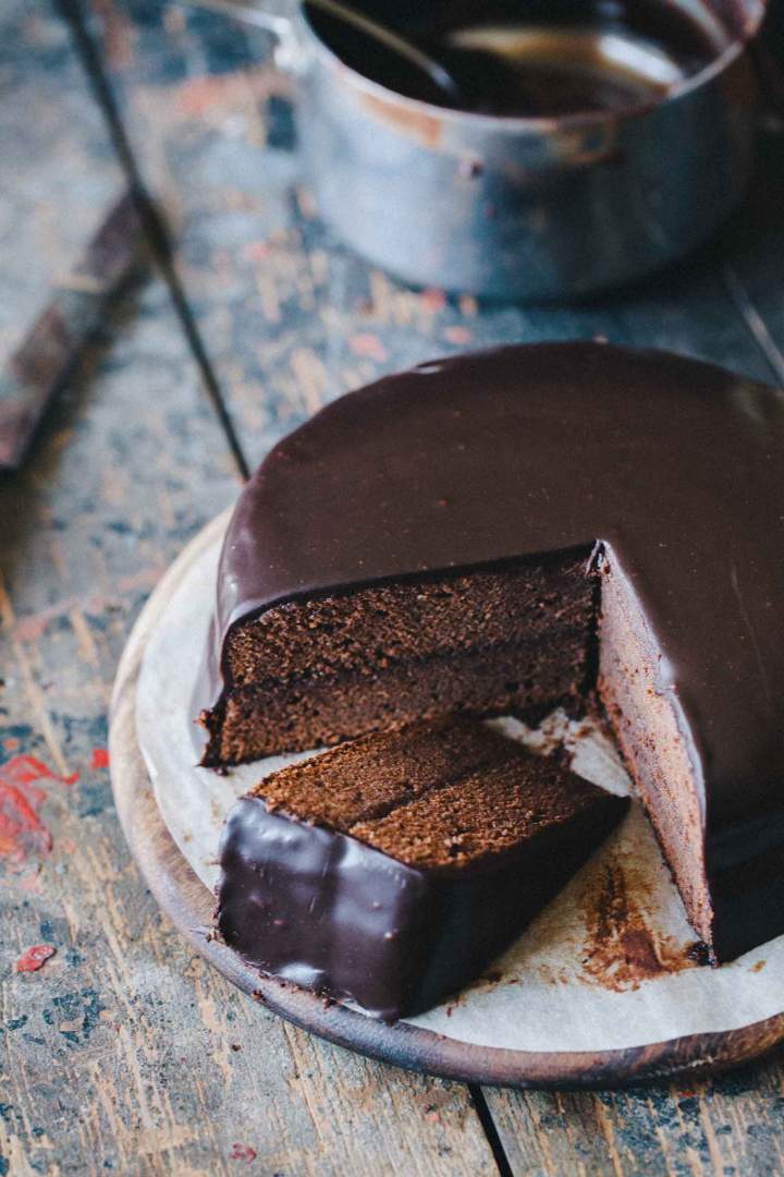 Sacher torte cut on slices with layers of chocolate and marmelade
