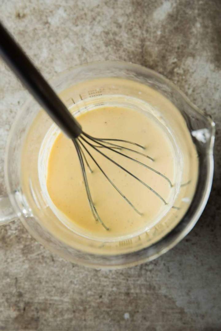 Preparing a topping for Seasonal Vegetables and Tuna Mediterana Tart