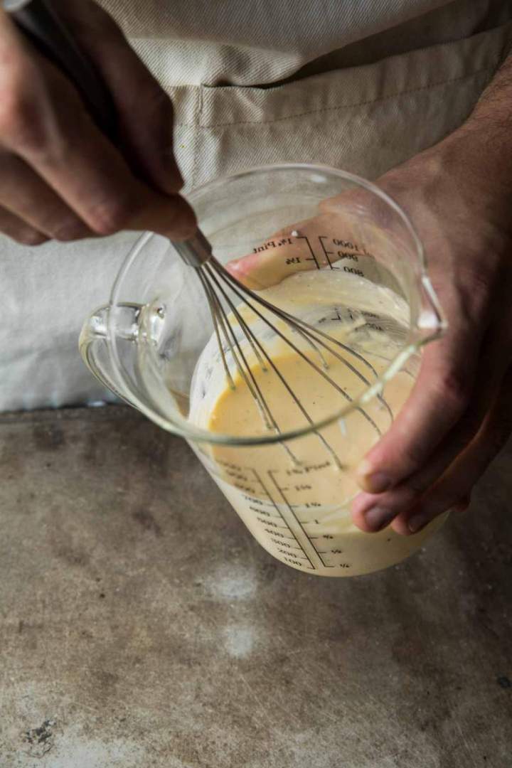Preparing a topping for Seasonal Vegetables and Tuna Mediterana Tart