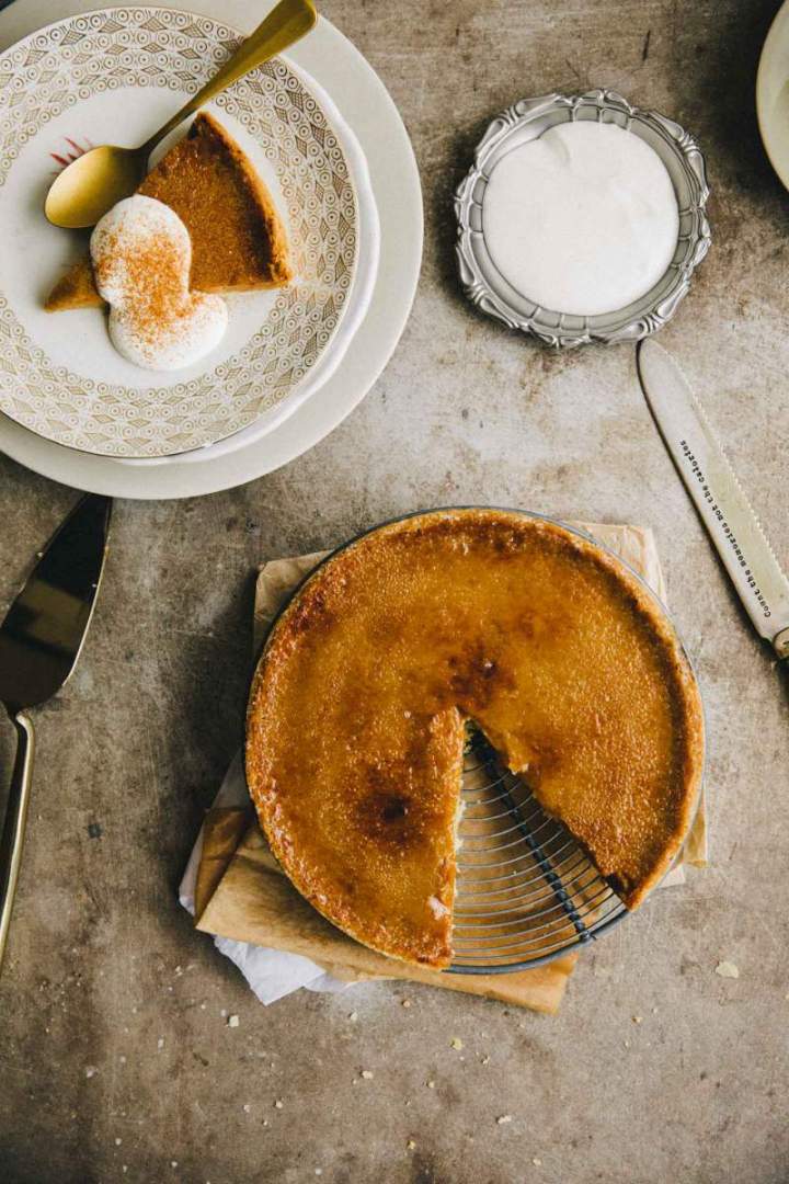 Bruleed Pumpkin Pie served with sour cream and cinnamon