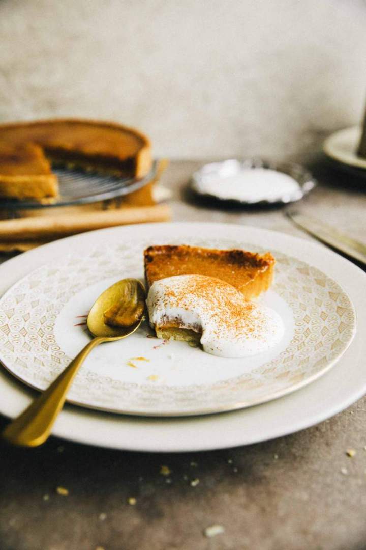 Bruleed Pumpkin Pie served with sour cream and cinnamon