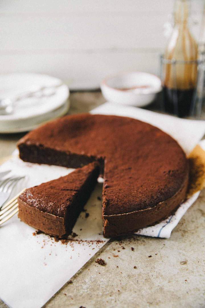 Flourless espresso chocolate cake ready to be served