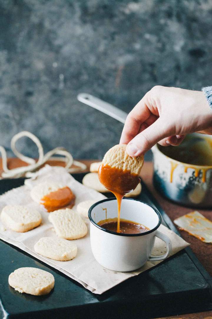 Peanut butter cookies dipped in salty caramel